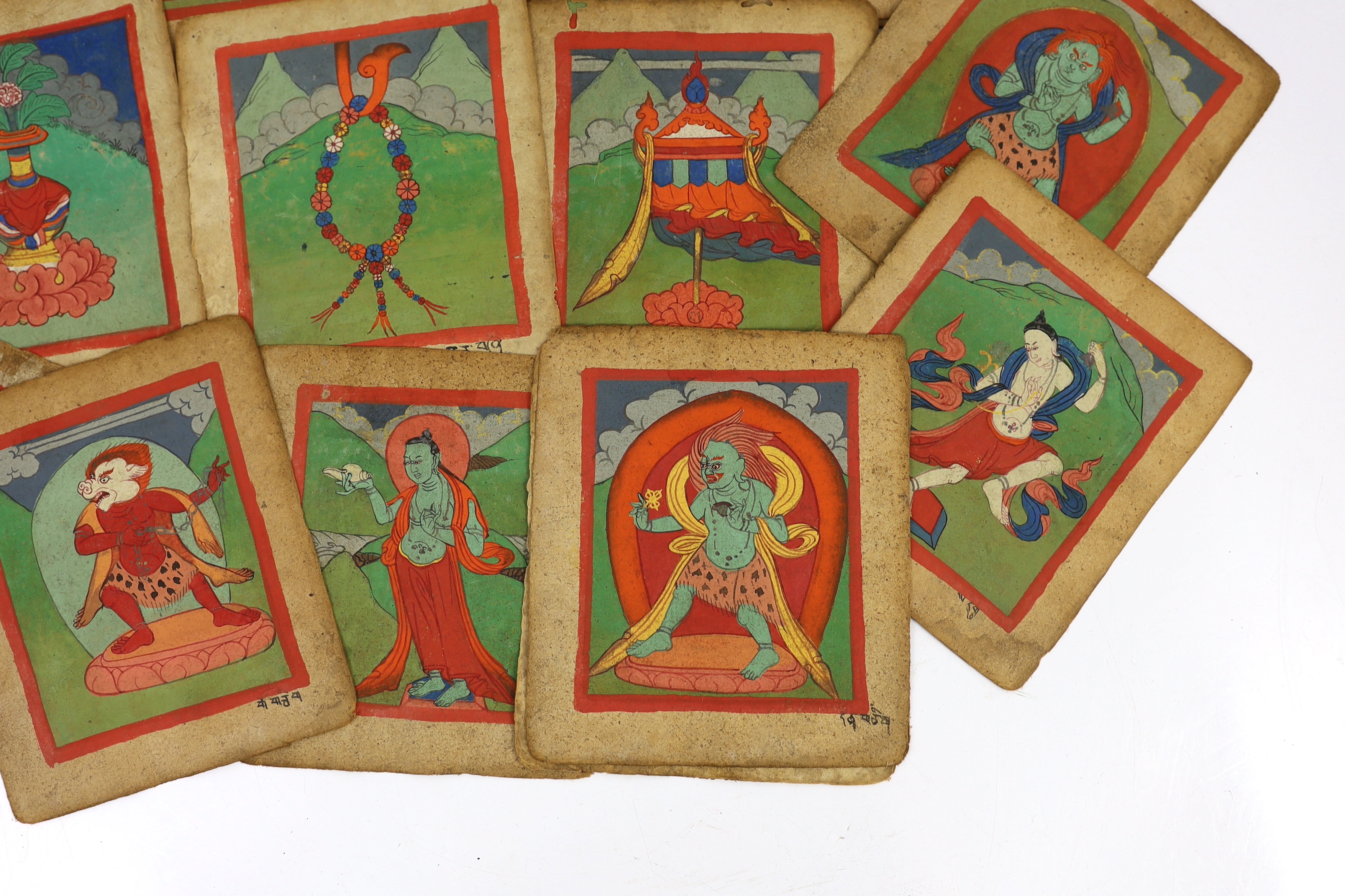 A set of thirty six Tibetan painted thangka pages, 19th century